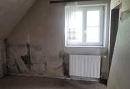 Renovierungsbedürftiges Einfamilienhaus in traumhafter Aussichtslage mit sonnigem Grundstück