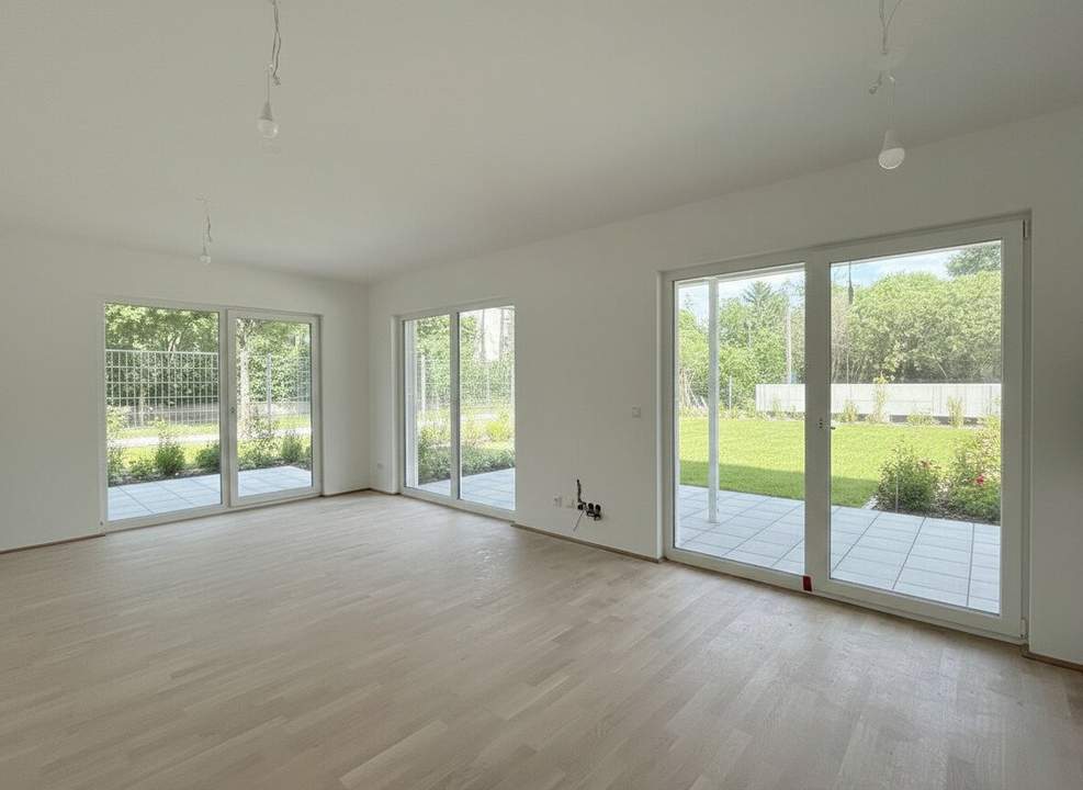 Erstbezug! Schöne Dreizimmerwohnung mit Garten
