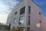Top ausgestattetes GARTENAPARTMENT mit einer EXTRA TERRASSE und einem TIEFGARAGENPLATZ