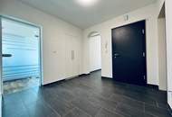 Familienfreundliche 4-Zimmer-Wohnung mit Tiefgaragenabstellplatz, Loggia, Gartenanlage & nachhaltiger Heizung