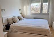 Helle 4-Zimmer-Wohnung (ca. 93 m²) mit Loggia und Parkblick. Master-Schlafzimmer mit eigenem Badezimmer.