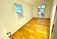 ERSTBEZUG! Geräumige Eigentumswohnung im Obergeschoss mit Balkon und größer Dachterrasse