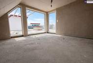 Penthouse-Feeling pur: Moderne Neubauwohnung mit großzügiger Wohnfläche, Balkon und beeindruckender Dachterrasse!