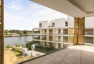 Wohnen, wo andere Urlaub machen: Erstklassige 5-Zimmer-Wohnung am Wasser mit 70m2 Balkon