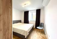 Exklusive 3-Zimmer-Dachgeschoss-Oase mit sonnigem Balkon & grünem Innenhof
