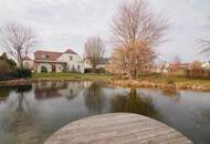 Exquisites Einfamilienhaus mit großem Garten und Schwimmteich