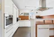 DREI SEEN. EIN ZUHAUSE. – Modernes Wolf Haus mit Garten und Vollkeller in Feld am See