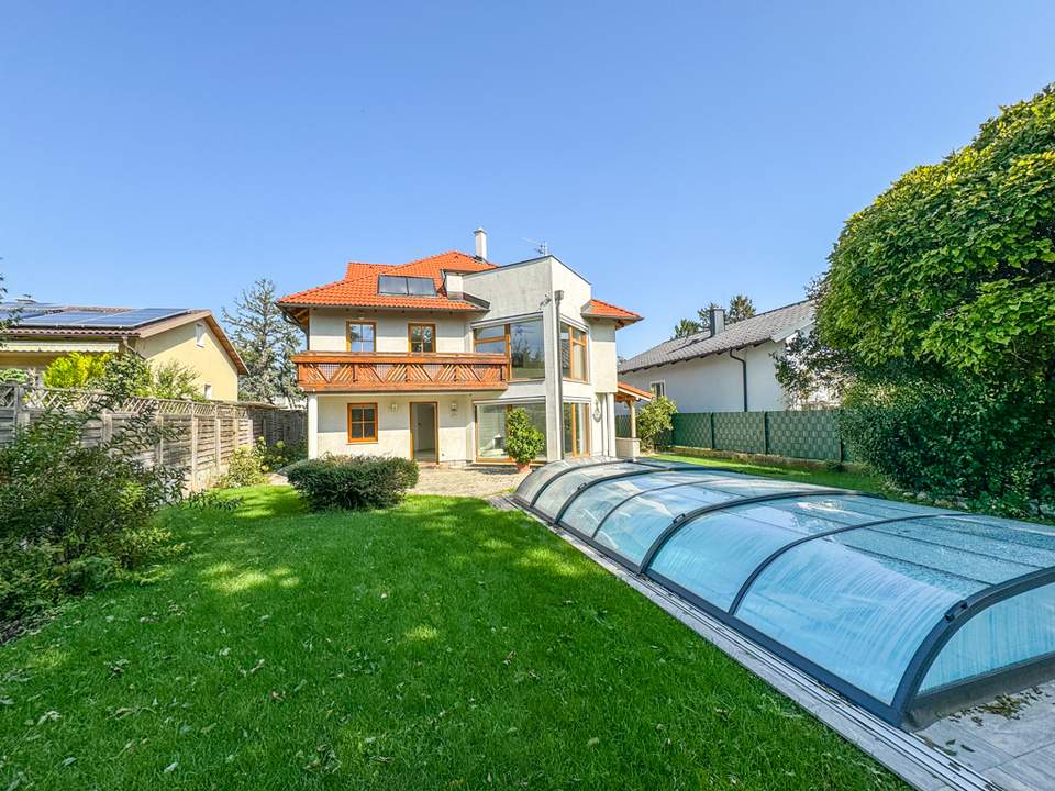 Exklusives Wohnen vor den Toren Wiens – Traumhaftes Haus mit Garten & Pool