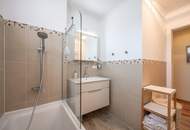 "Kaminfeuer trifft Gartentraum: Topmoderne Gartenwohnung im Wienerwald"