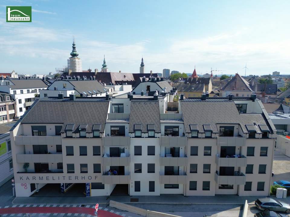 Gartenwohnung mitten in der Stadt! Karmeliterhof - Neubauwohntraum beim Rathausplatz