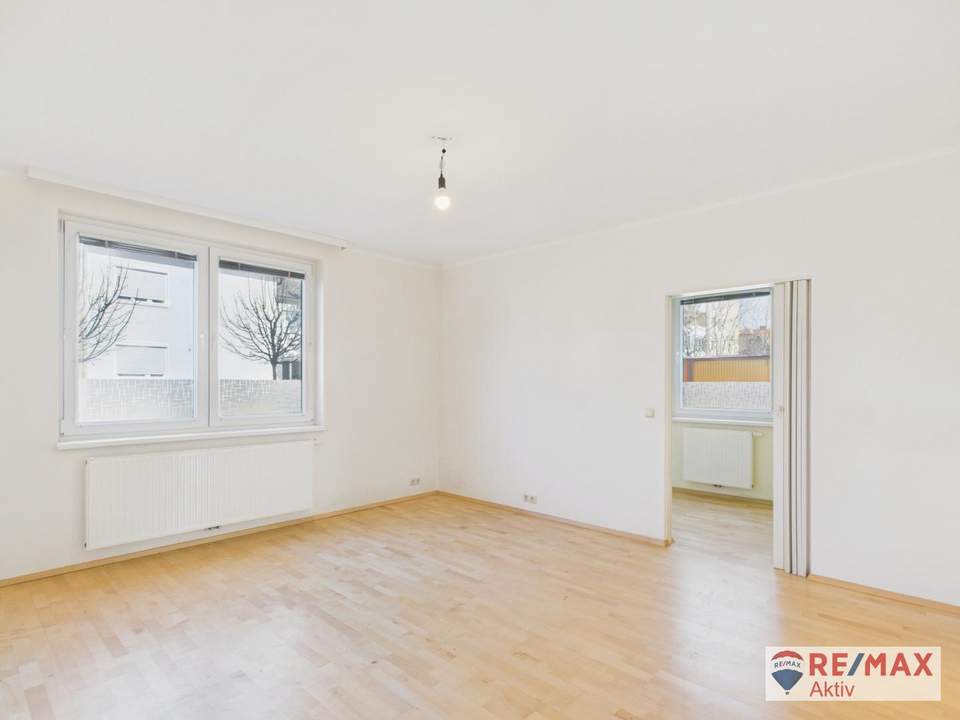 Eigentumswohnung in Top Lage mit Garage und Eigengarten!