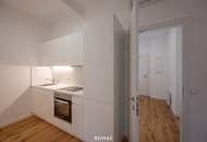 Sanierter Altbau mit modernem Neubau