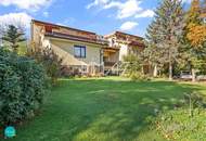 Großzügige 4-Zimmer Gartenwohnung mit großer Terrasse in ruhiger Grünlage!