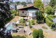 Einfamilienhaus mit Salzwasserpool, Wintergarten, Garage und zwei Carports