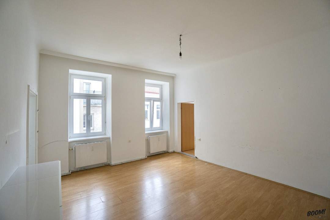 Renovierungsbedürftige Altbauwohnung in zentraler Lage - Perfekt für Singles oder Paare!