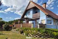 Sonniges Einfamilienhaus mit gepflegtem Garten, Terrasse, Balkon und Doppelgarage