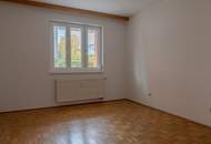 Freundliche Erdgeschosswohnung mit Tiefgaragenplatz und Loggia