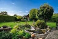 Sommer im eigenen Garten mit Pool, Kaminfeuer im Winter – ein Haus fürs ganze Jahr