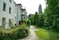 Einziehen und wohlfühlen! Moderne 2-Zimmerwohnung in Grün- und Ruhelage mit Terrasse und Eigengarten – Carport inklusive!