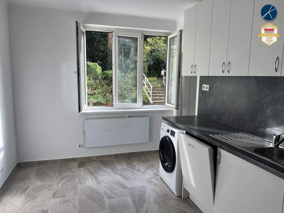 Wohnküche mit Gartenblick + Zimmer