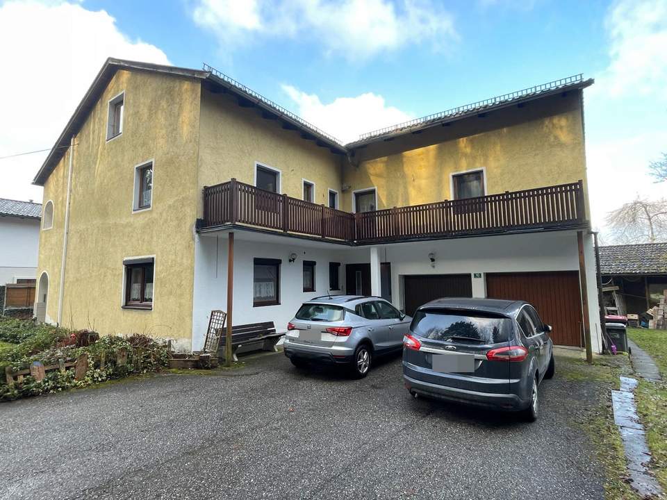 ***OPEN HOUSE Freitag, 14. März 2025 von 15 - 18 Uhr***Mehrfamilienhaus in idyllischer Lage am Bachlauf