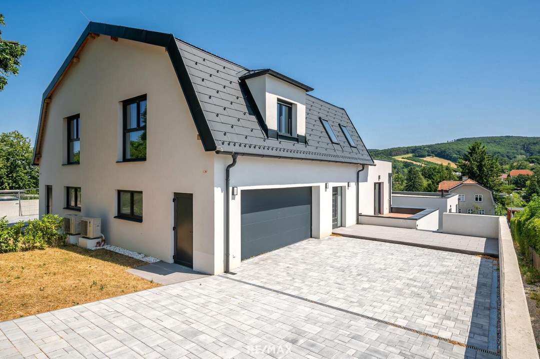 Erstbezug: Großzügiger Familientraum mit unverbaubarem Grünblick!