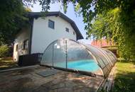 Moderne Eleganz in Wiens grüner Oase - Traumhaftes Einfamilienhaus mit Pool und Garage