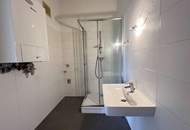 Klimatisierte, großzügige 2-Zimmer-Dachgeschosswohnung mit herrlichem Blick ins Grüne!
