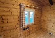 Urbanes Wohnen mit großem Garten mit kleinem Einfamilienhaus in Essling