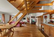 Wohngenuss im Dachgeschoss – Seeblick, Wellnessoase & alpiner Charme vereint