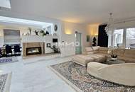 Zeitlose Architektur trifft Großzügigkeit - Designvilla mit Indoor-Pool und Einliegeroption