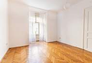 Altbau-Charme mit 3 Zimmern und Süd-Balkon in zentraler Lage