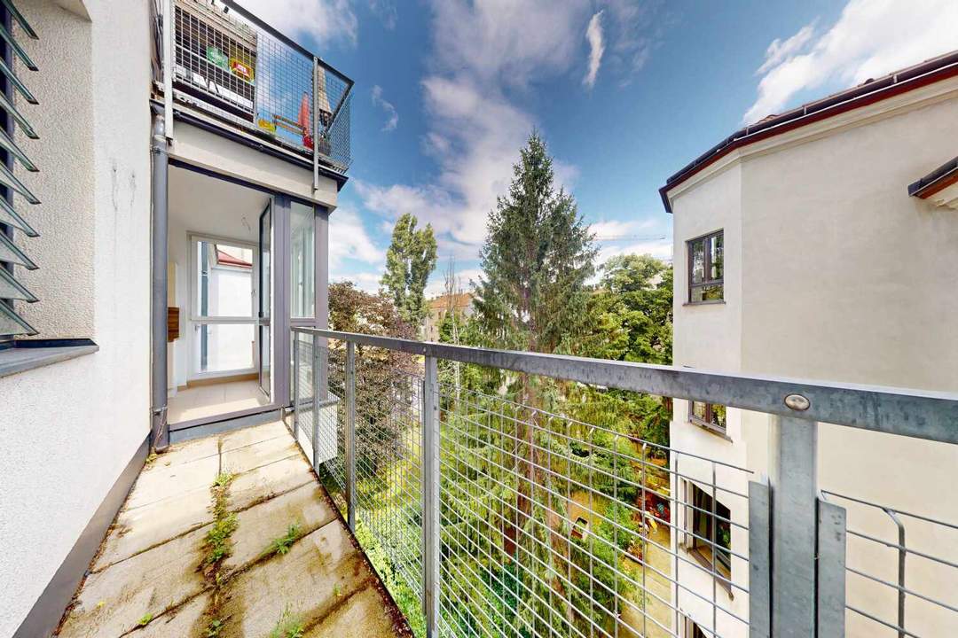 Historischer Charme trifft moderne Wohnqualität – 3-Zimmer-Wohnung mit Innenhof-Terrasse