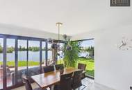 An Exceptional Waterfront Retreat with Private Beach and Unrivaled Privacy