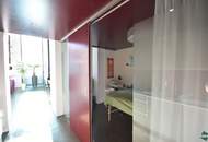 Flexibel gestaltbares Büro mit großen Glasfronten am Donaukanal