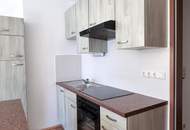 Wohnung mit Loggia und Tiefgaragenplatz direkt im Ortszentrum