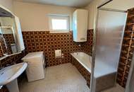 Mehr Raum, mehr Möglichkeiten - vielseitiges Zweifamilienhaus mit Gartenidylle!