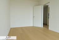 Erstbezug - Sonnige 2-Zimmer Wohnung mit Roof-Top-Pool und Blick über Skyline von Wien!