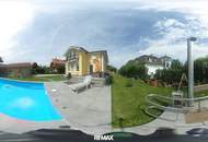 Neuwertiges 5-Zi. Einfamilienhaus mit Pool, 2 Terrassen & 2 Garagen in Deutsch-Haslau!