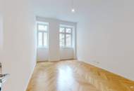 "Urban Oasis" - Moderne Altbauwohnung mit einzigartiger Raumhöhe und Terrasse