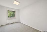 Neubauwohnung mit Grünblick und 4-Zimmer Möglichkeit in einem gepflegten Haus