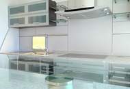„Wohnung mit Parkplatz und Concierge" im 11. Stock mit Loggia um € 1.300