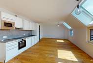 Moderne Dachgeschosswohnung, klimatisiert und gut geschnitten