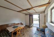 Älteres Kleinwohnhaus mit Potenzial samt Südbalkon mit Aussicht