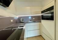 Neuwertige, südseitig ausgerichtete 2-Zimmer-Wohnung mit offen gestaltetem Koch-/Wohn-/Essbereich!