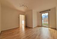 Schicke Neubauwohnung mit kl. Garten in idyllischer Ruhelage