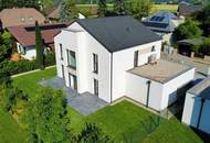 Exklusives 5-Zimmer-Einfamilienhaus mit Garage - Schlüsselfertig - Großzügige Wohnflächen trifft auf idyllischen Eigengarten - Wohnkomfort auf höchstem Niveau