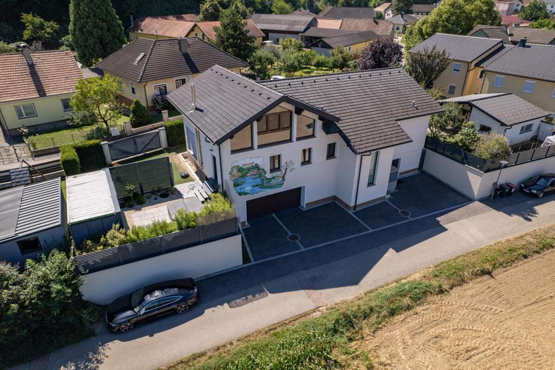 Exklusives Einfamilienhaus mit Ausblick und Wellnessbereich