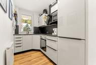 Stilvolle Gartenwohnung in Ruhelage mit eigenem Carport