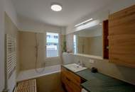 Neuwertige 3-Zimmer-Wohnung unweit Auhofcenter mit 95 m² Eigengarten, Wellnessbereich & Top-Anbindung